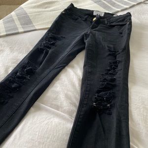 FRAME BLACK RIPPED SKINNY JEANS